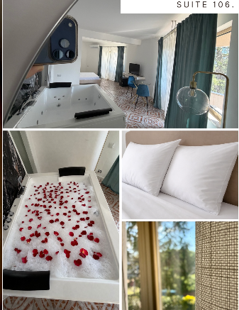 Suite 106 — hot tub and bedroom